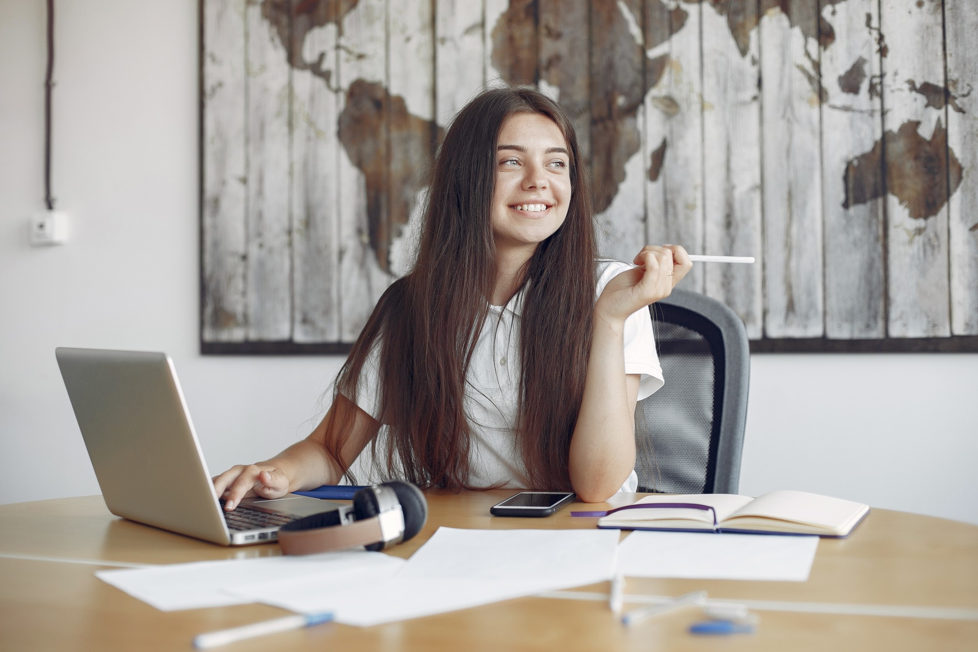 young-student-sitting-table-use-laptop-1-1